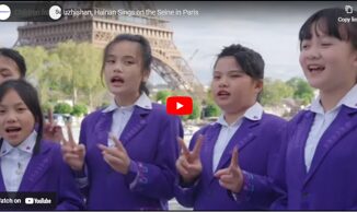 Children from Wuzhishan Hainan Sings on the Seine in Paris during the opening performance of the Sino French Gourmet Carnival