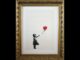 Rubano stampa Ragazza con Palloncino di Banksy incriminate 2 persone