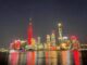 Oriental Pearl and Shanghai Tower together with towers around the worldlight up in red in celebration of the Spring Festival of the Year of the Snake